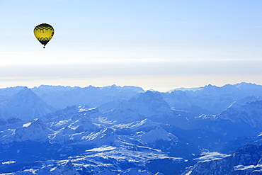 Hot-air balloon flying above Dolomites with Antelao, Averau, Nuvolau and Pelmo, aerial photo, Dolomites, South Tyrol, Italy, Europe