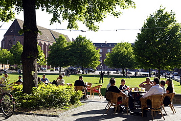 People sitting at a cafe at the Arts Centre, Kulturzentrum Kaserne, Basel, Switzerland