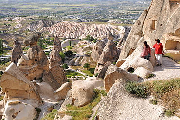 Two women looks at a valley near Uechisar, Cappadocia, Anatolia, Turkey