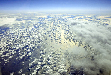 clouds over sea, view from an airplane, Spain