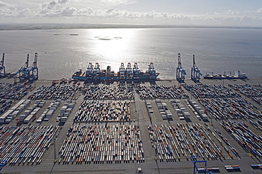 Aerial view of the container port, Containers and loading cranes in the backlight, Bremerhaven, northern Germany