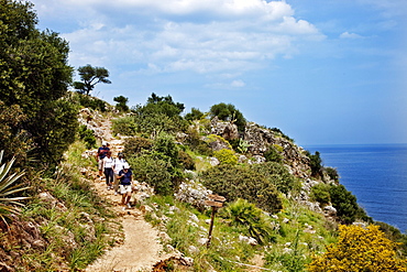 Hiker at Zingaro nature reserve, Sicily, Italy