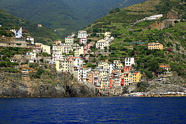 View from the sea to Riomaggiore, boat trip along the coastline, Cinque Terre, Liguria, Italian Riviera, Italy, Europe