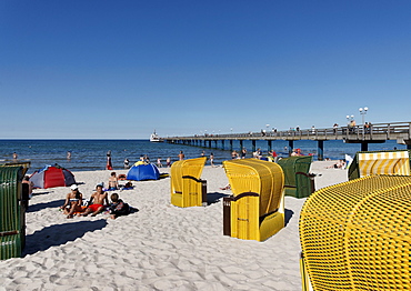 People and beach chairs on the beach in the sunlight, Baltic resort Binz, Ruegen, Mecklenburg-Western Pomerania, Germany, Europe