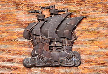 Relief of a Hanseatic cog at a brick wall at harbour, Hanseatic town Stralsund, Mecklenburg-Western Pomerania, Germany, Europe