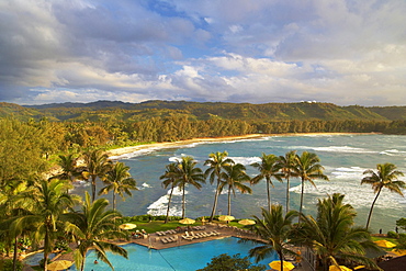 Pool under palm trees at the coast in the evening, North Shore, Turtle Bay, Oahu, Hawaii, USA, America