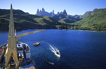 The freighter Aranui III anchoring off the island of Ua Pou, French Polynesia