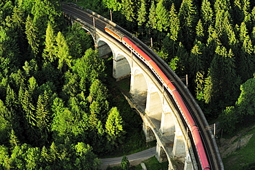 Train passing Kalte Rinn-viaduct, Semmering railway, UNESCO World Heritage Site Semmering railway, Lower Austria, Austria