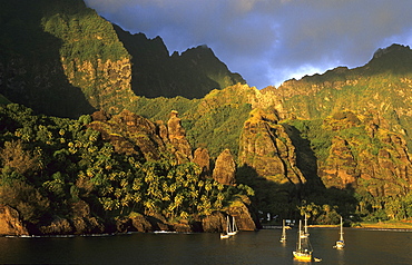 Boats anchoring in the Bay of Hanavave on the island of Fatu Iva, French Polynesia