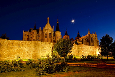 Episcopal Palace at night, Palacio Episcopal, Astorga, from the 19th century, architect Antoni Gaudi, Modernismo, Modernism, Art Nouveau, Camino Frances, Way of St. James, Camino de Santiago, pilgrims way, UNESCO World Heritage, European Cultural Route, province of Leon, Old Castile, Castile-Leon, Castilla y Leon, Northern Spain, Spain, Europe