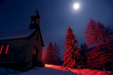 St. Anna chapel in the snow at full moon, Hemmersuppenalm, Reit im Winkl, Chiemgau, Upper Bavaria, Bavaria, Germany, Europe