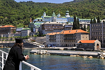 Monk on his way to Athos mountain, monastery Moni Panteleimonos, Chalkidiki, Greece