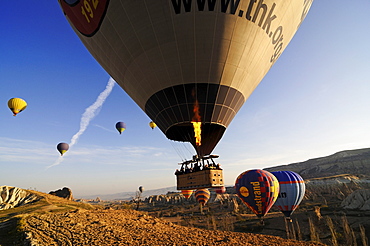 Hot-air-balloons over the Goereme valley, Goereme, Cappadocia, Turkey