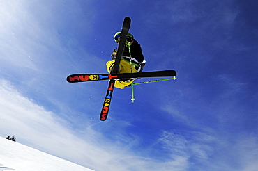 Low angle view at skier during jump, Reit im Winkl, Chiemgau, Upper Bavaria, Bavaria, Germany, Europe