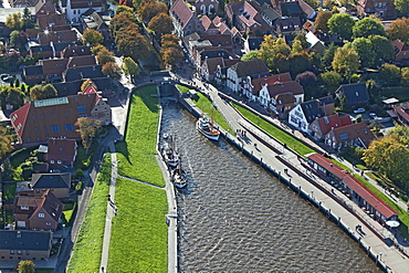 Aerial view of a fishing harbour with fishing boats, Greetsiel, Lower Saxony, Germany