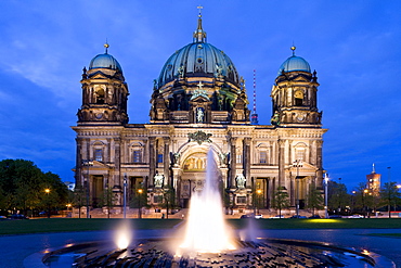 The illuminated Cathedral of Berlin in the evening, Berliner Dom and the Television Tower in the background, Berlin, Germany, Europe