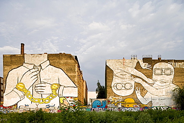 Wall paintings on buildings at Cuvry Street, Berlin-Kreuzberg, Berlin, Germany, Europe