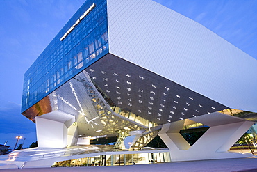 Porsche Museum in Stuttgart-Zuffenhausen in the evening, designed by the architects Delugan Meissl Associated Architects in cooperation with HG Merz, Stuttgart, Baden-Wuerttemberg, Germany, Europe