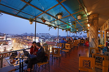 Terrace cafe with a view over the city in the evening, Hanoi, Bac Bo, Vietnam