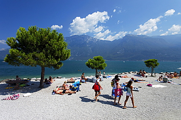 People on the beach, nearby Limone, Lake Garda, Lombardy, Italy