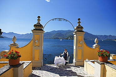 Outdoor, Staff lays the table, Hotel Royal Victoria, Varenna, Lake Como, Lombardy, Italy