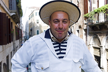 Cheerful gondolier, Gondolieri wearing traditional clothes, Venice, Veneto, Italy, Europe