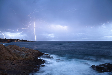 Thunderstorm and surf in Algajola Bay, North-west coast, Balagne region, Corsica, France, Europe