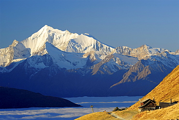 Weisshorn above sea of fog in valley of Rhone, Kuehboden, Eggishorn, Fiesch, UNESCO World Heritage Site Swiss Alps Jungfrau - Aletsch, Bernese Alps, Valais, Switzerland, Europe