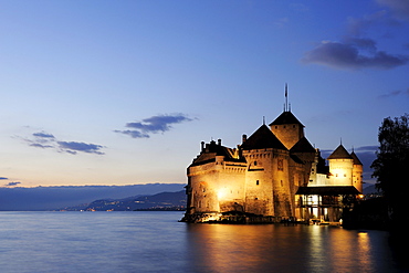 Illuminated castle Chillon at lake Geneva in the evening, lake Geneva, Lavaux Vineyard Terraces, UNESCO World Heritage Site Lavaux Vineyard Terraces, Vaud, Switzerland, Europe