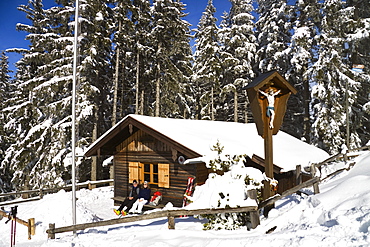 Skiing hut on Hoernle mountain in the sunlight, Ammergau Alps, Upper Bavaria, Germany, Europe