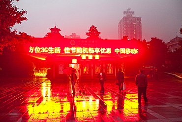 Shapingba District in the evening, skyscrapers and advertisement, Chongqing, People's Republic of China