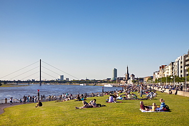 View at people in the Rhine meadows and old town, Duesseldorf, Duesseldorf, North Rhine-Westphalia, Germany, Europe