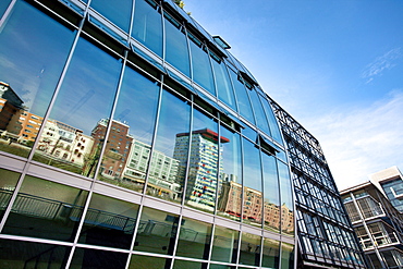 Reflection on glass facade, Media Harbour, Duesseldorf, Duesseldorf, North Rhine-Westphalia, Germany, Europe