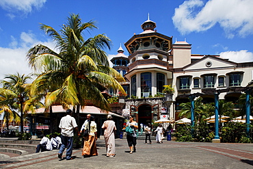 People in front of the Le Caudan Waterfront shopping center, Port Louis, Mauritius, Africa