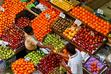 People at stalls in the market hall, Port Louis, Mauritius, Africa