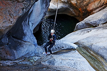 People canyoning at Canyon du Fleur Jaune bei Cilaos, La Reunion, Indian Ocean