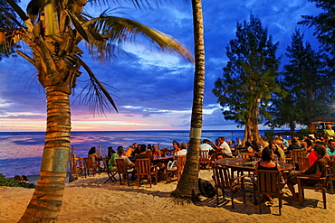 People in a beach bar in the evening, Saint Gilles, La Reunion, Indian Ocean