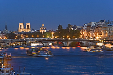 Night shot of the river Seine with bridges and Notre Dame, Paris, France, Europe