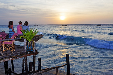 People on the terrace of the Z Hotel at sunset, Nungwi, Zanzibar, Tanzania, Africa