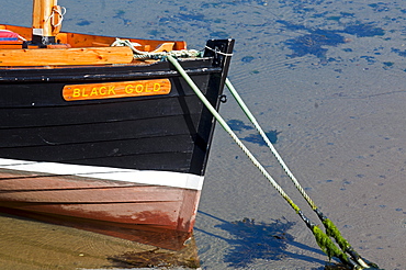 wooden boat in new harbour of Portsoy, Aberdeenshire, Scotland