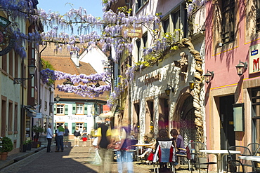 Konviktgasse, people with motion blur, historic part of Freiburg im Breisgau, Baden-Wuertemberg, Germany