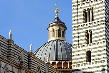 Facade of Siena cathedral with dome and spire, Siena, UNESCO World Heritage Site Siena, Tuscany, Italy