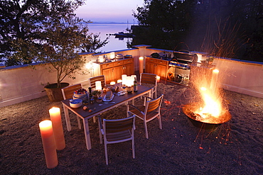 Outdoor kitchen and firepot, Lake Chiemsee, Chiemgau, Bavaria, Germany