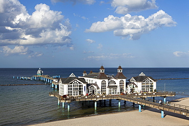 Clouds over the pier and beach, Sellin seaside resort, Ruegen island, Baltic Sea, Mecklenburg-West Pomerania, Germany