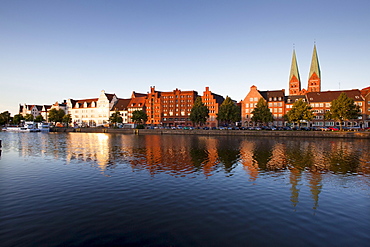 Old storehouses at Holsten harbour, St MaryÂ¥s church, Hanseatic city of Luebeck, Baltic Sea, Schleswig-Holstein, Germany