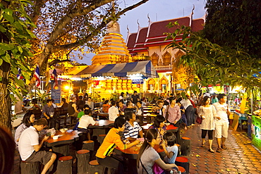 People at tables of restaurants at the night market, Chiang Mai, Thailand, Asia