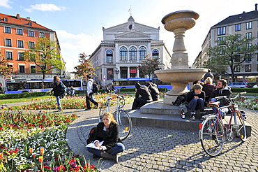 View of people at square Gaertnerplatz with theatre, Munich, Bavaria, Germany, Europe