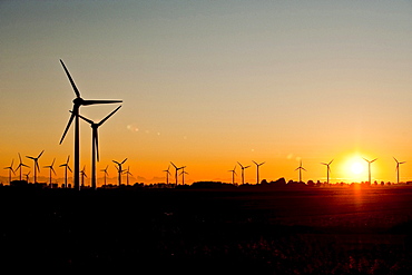 Wind wheels at a wind farm at sunset, Schleswig Holstein, Germany, Europe