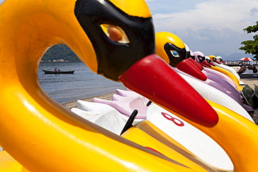 Pedal boats on the beach at PaquetÂ· Island in the Guanabara Bay, Brazil, South America, America