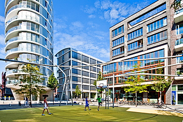 Children playing volleyball, HafenCity, Hamburg, Germany